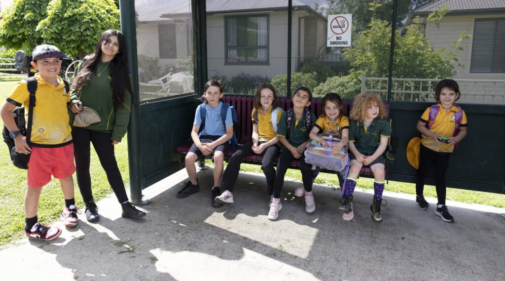 Children waiting at bus stop 
